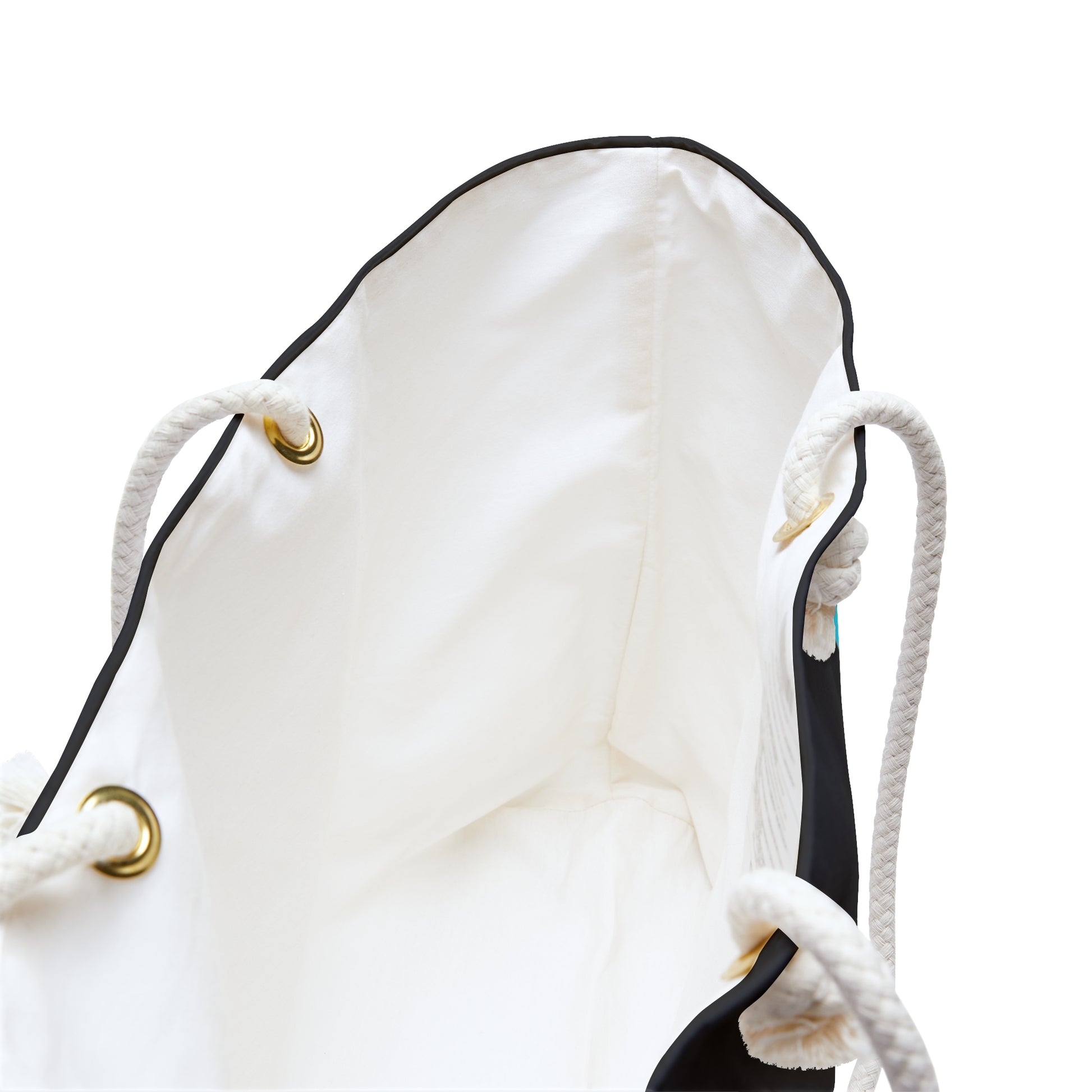 a white and black handbag with a rope handle