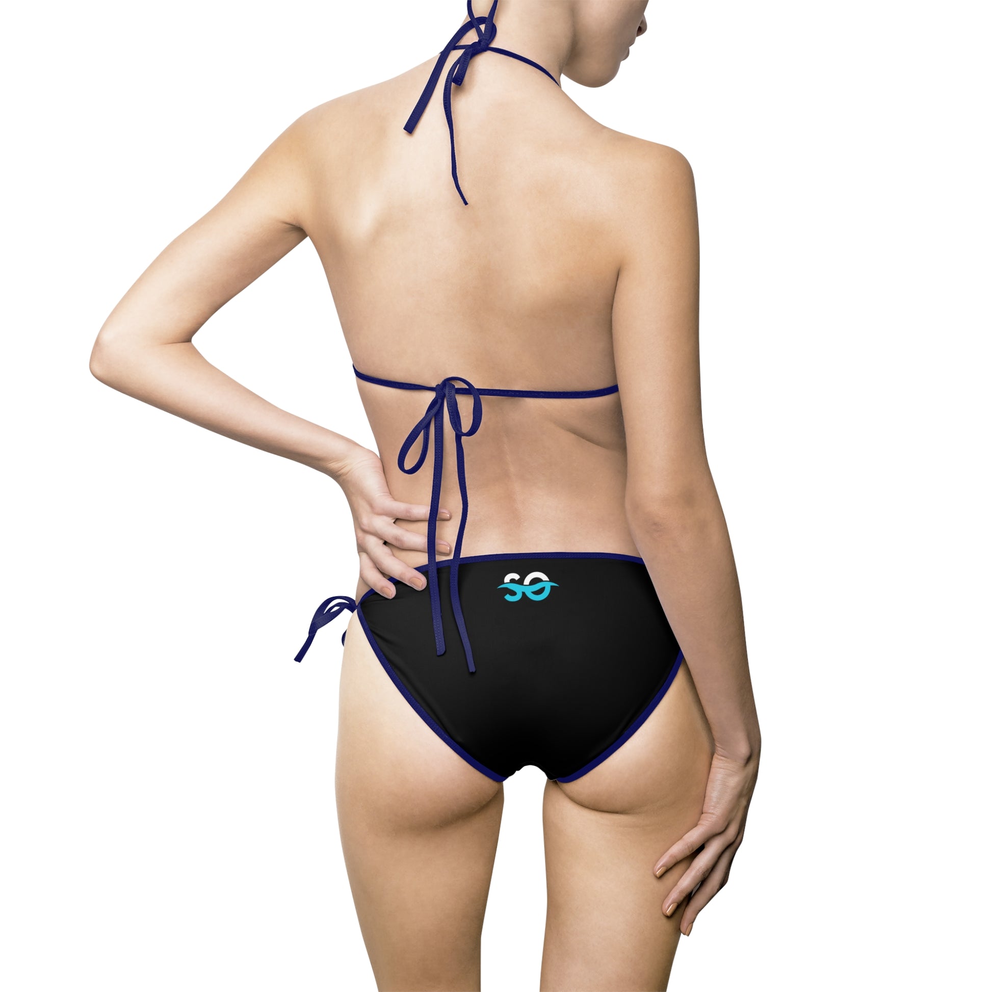 a woman in a black and blue bikini bottom