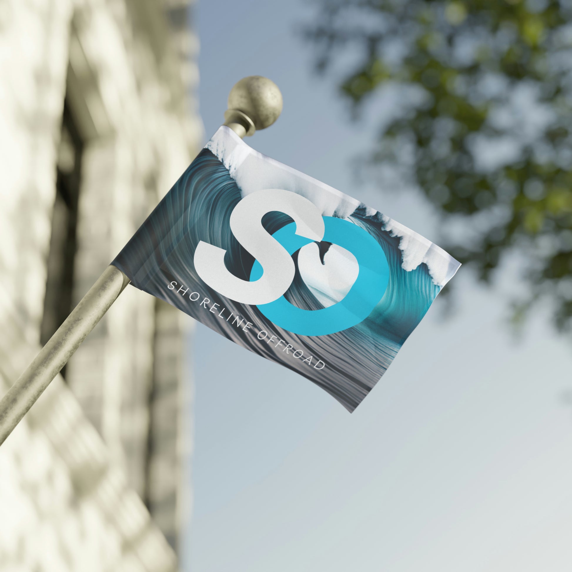 a blue and white sign hanging from the side of a pole