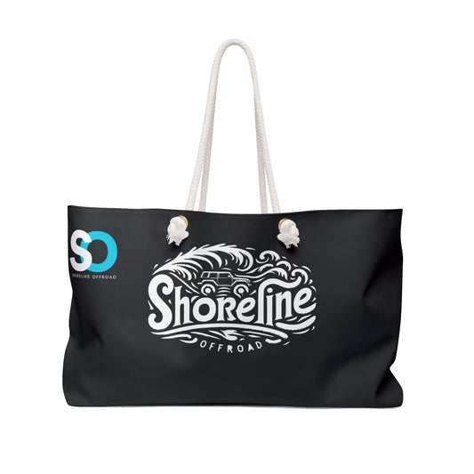 a black shopping bag with a white handle