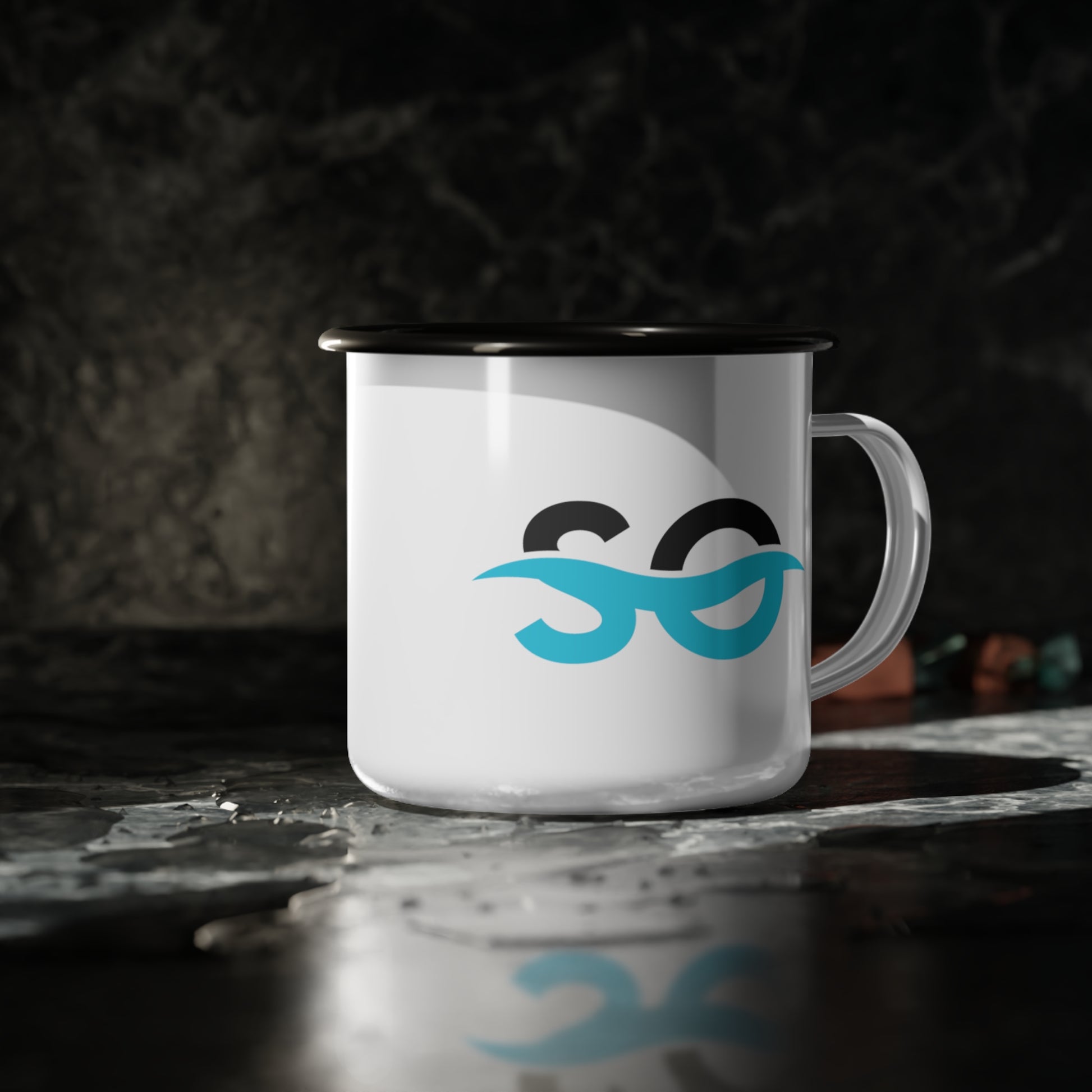 a white and blue coffee mug sitting on top of a table