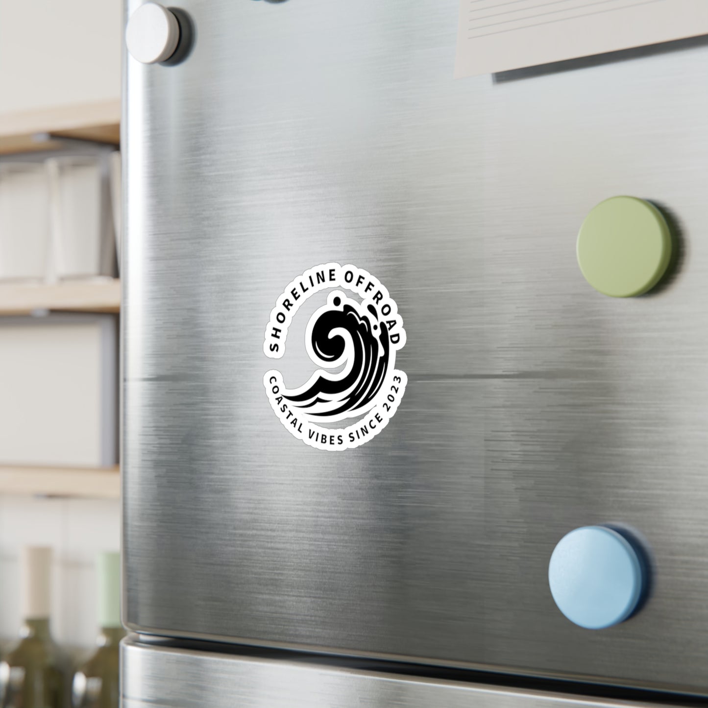 a stainless steel refrigerator with a sticker on it