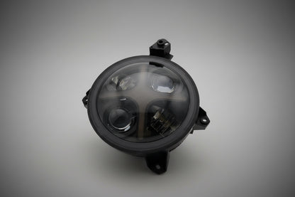 Close-up view of Shoreline Offroad Pro Series LED 9” JL JT RGB X Series Headlights highlighting the durable die-cast aluminum housing and vibrant RGB colors.