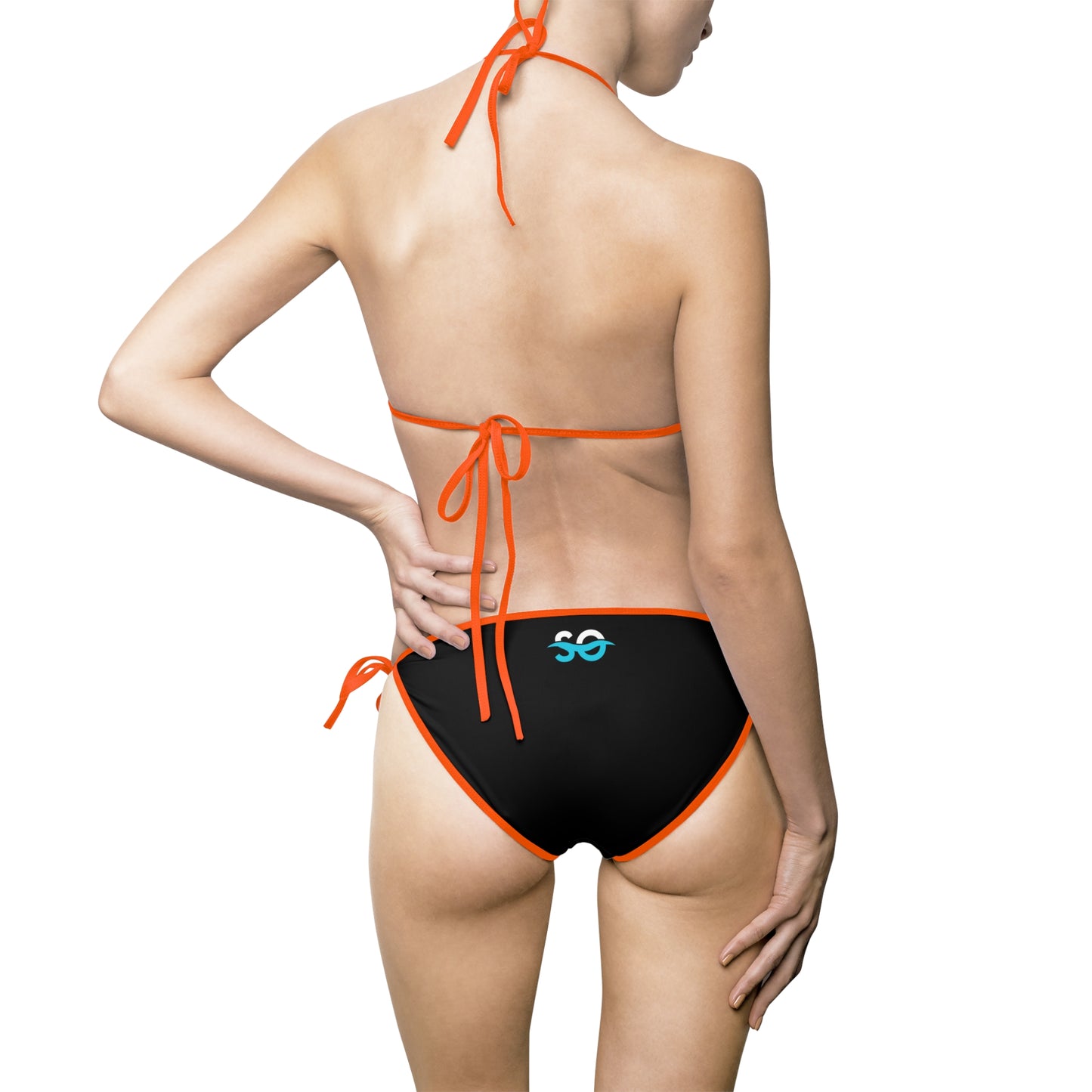 a woman in a black and orange bikini bottom