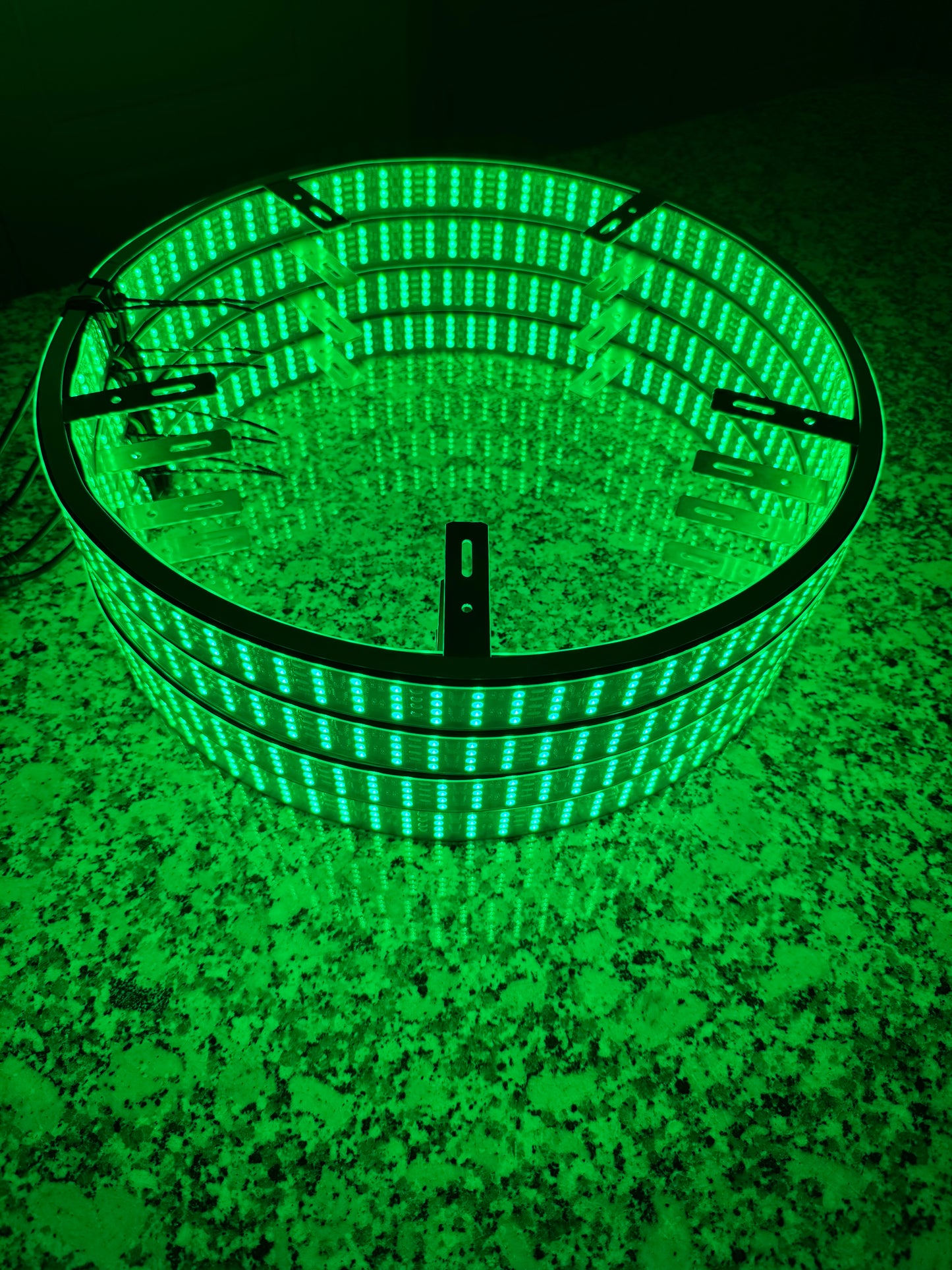 Installation setup of Shoreline Offroad Pro Series RGBIC LED Wheel Lights with stainless steel mounting clips.