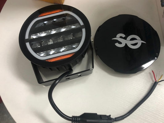 Close-up view of Shoreline Offroad Pro Series 5” RGBIC Pod Lights with detailed LED specifications and mounting options.