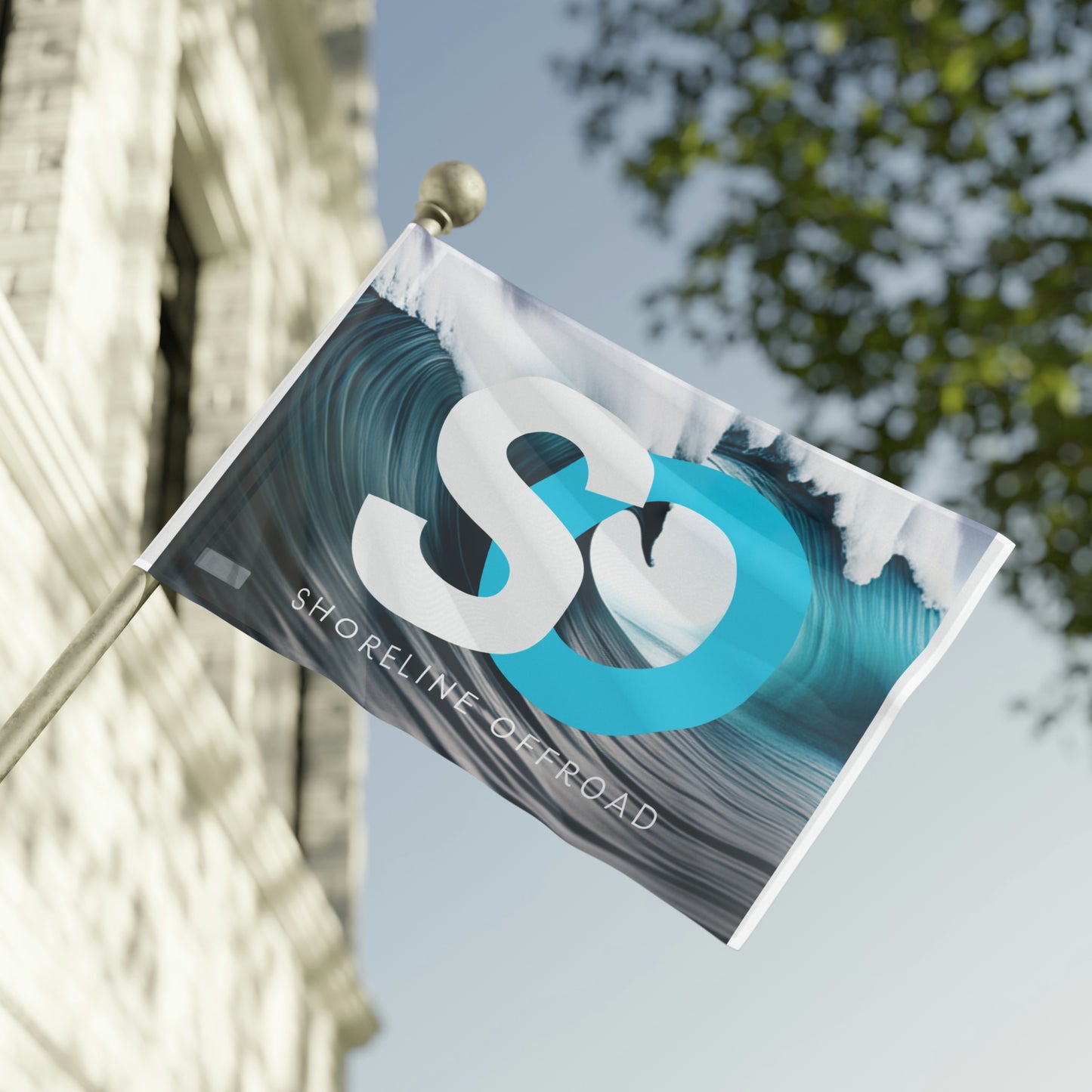 a blue and white sign hanging from the side of a building