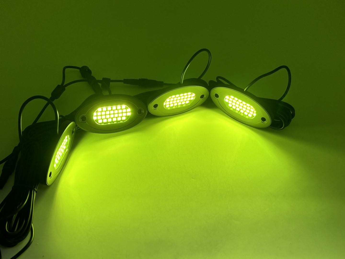 a group of green lights sitting on top of a table