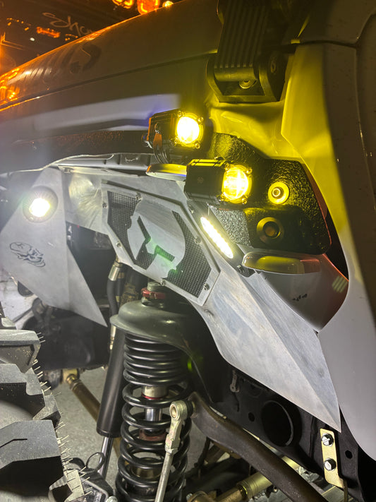 High-performance Shoreline Offroad Pro Series 1” Driving Light Pod Lights illuminating a dark trail, showcasing their intense brightness for off-road adventures.