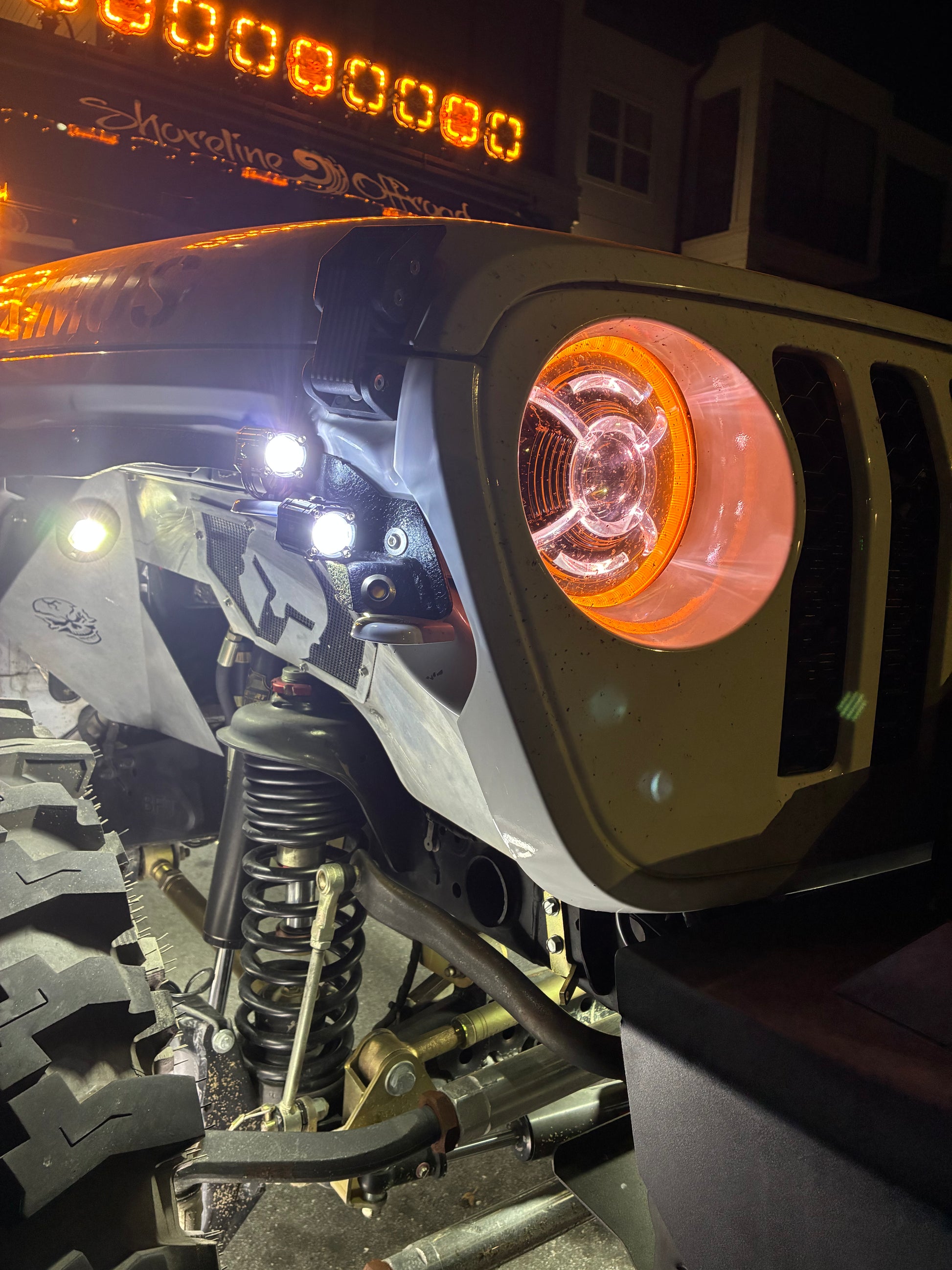 The dynamic strobe mode of the Shoreline Offroad Pro Series 1” Driving Light Pod Lights in action, combining yellow and white light for enhanced safety and visibility.
