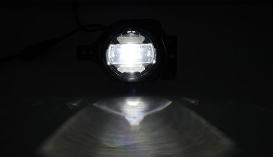 Shoreline Offroad Pro Series LED 4” RGB Fog lights showcasing a bright white beam, ideal as headlight replacements for Jeep JL JT models, designed for efficient lighting as part of Pro Series lighting accessories.