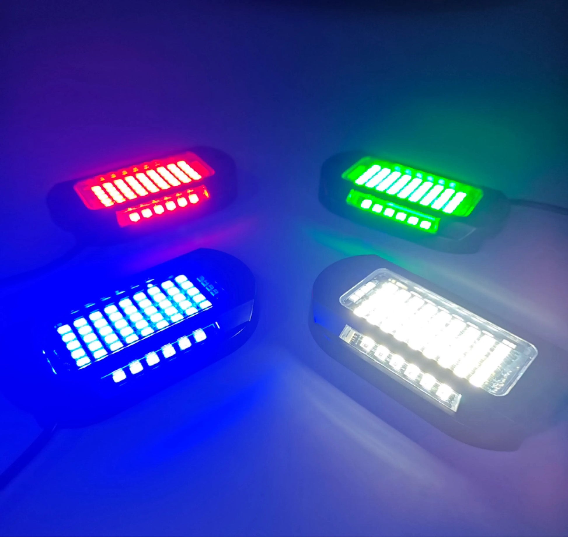 three different colored lights sitting next to each other