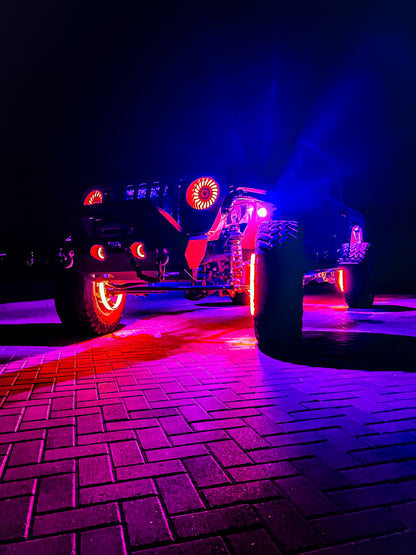 a car that is sitting on a brick road