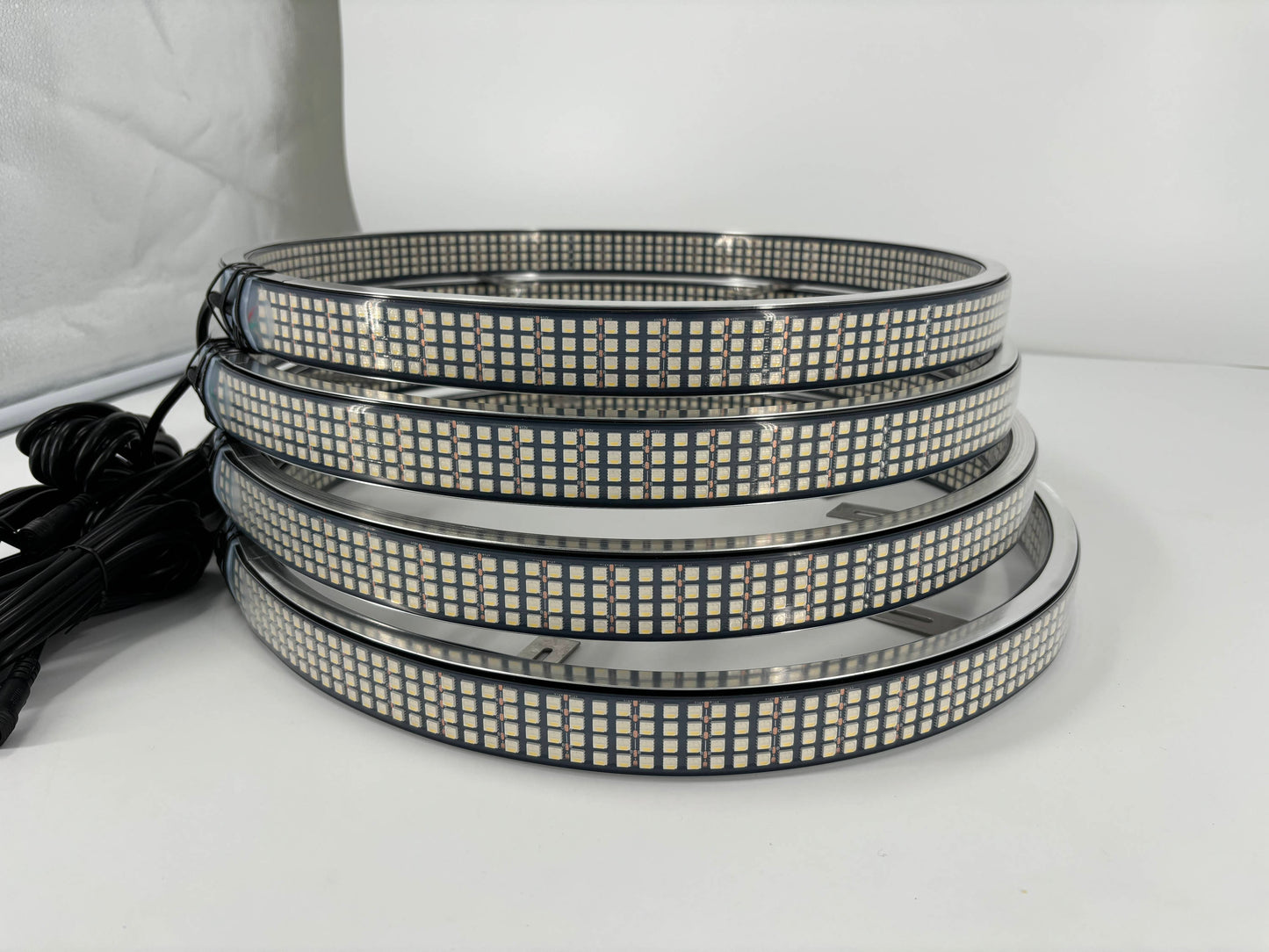 a set of four led strip lights sitting on top of a table