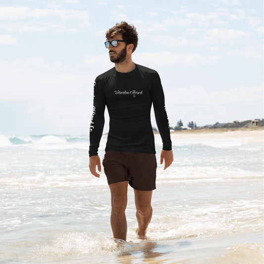 a man in a wet suit walking into the ocean