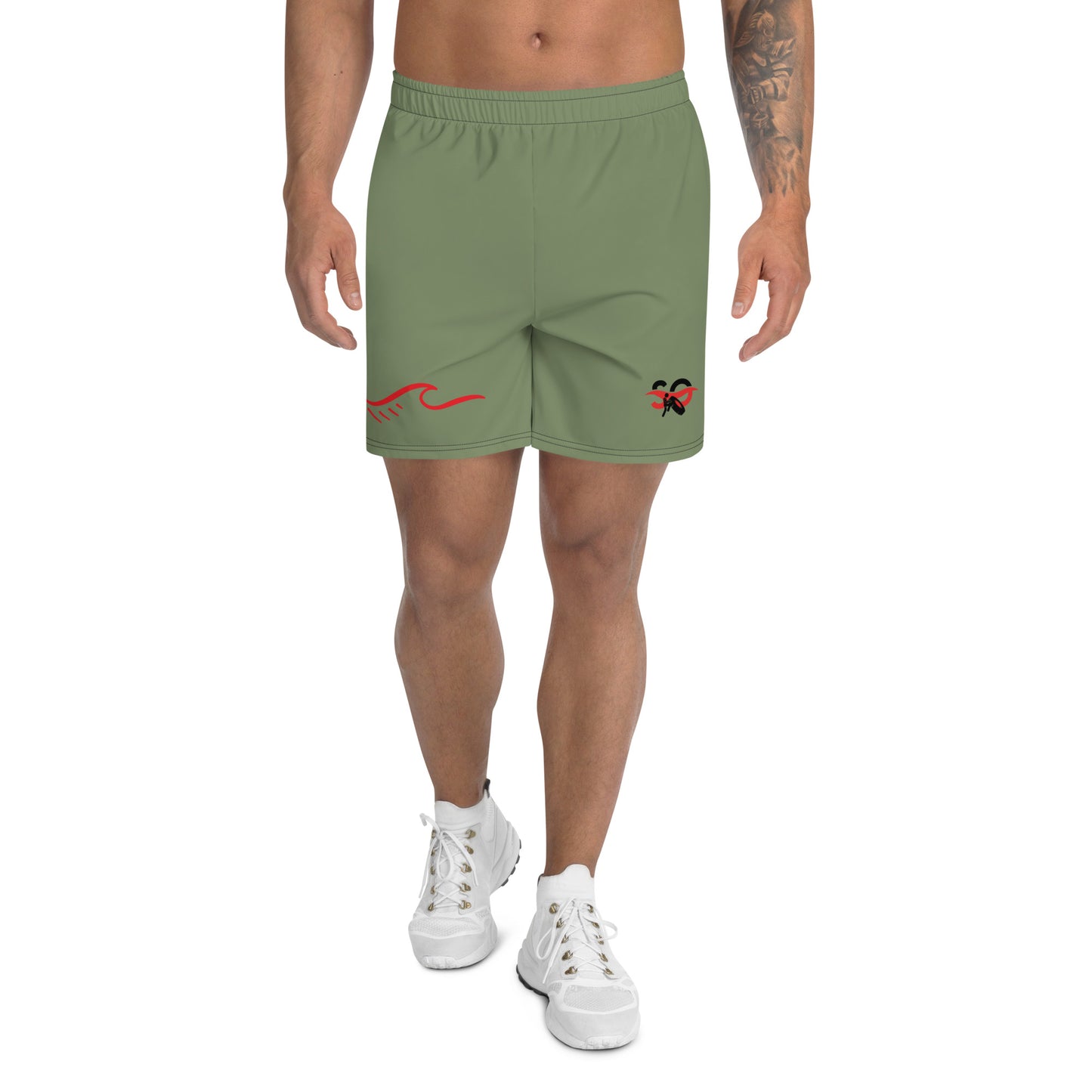 a man wearing a pair of green shorts