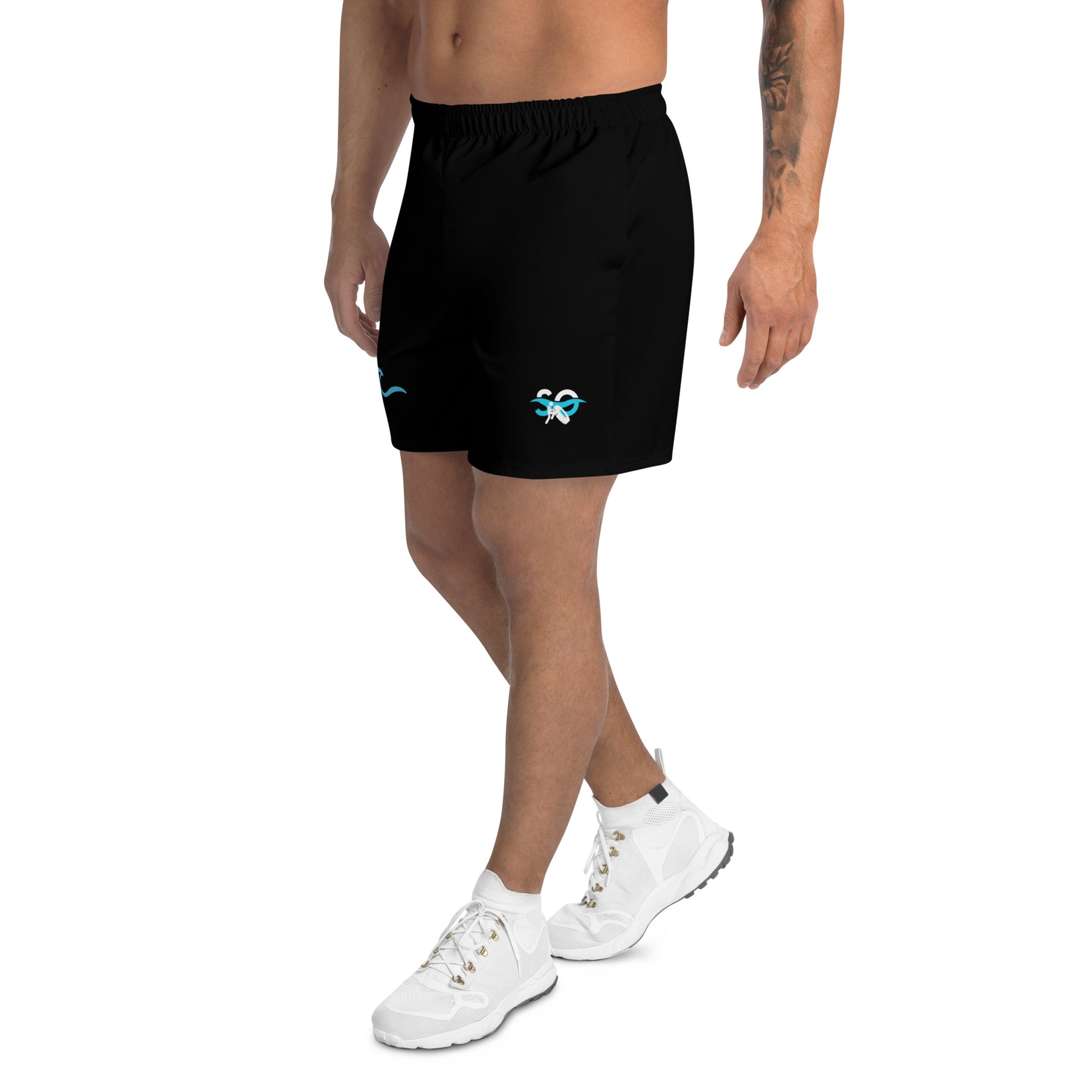 a man wearing a pair of black shorts