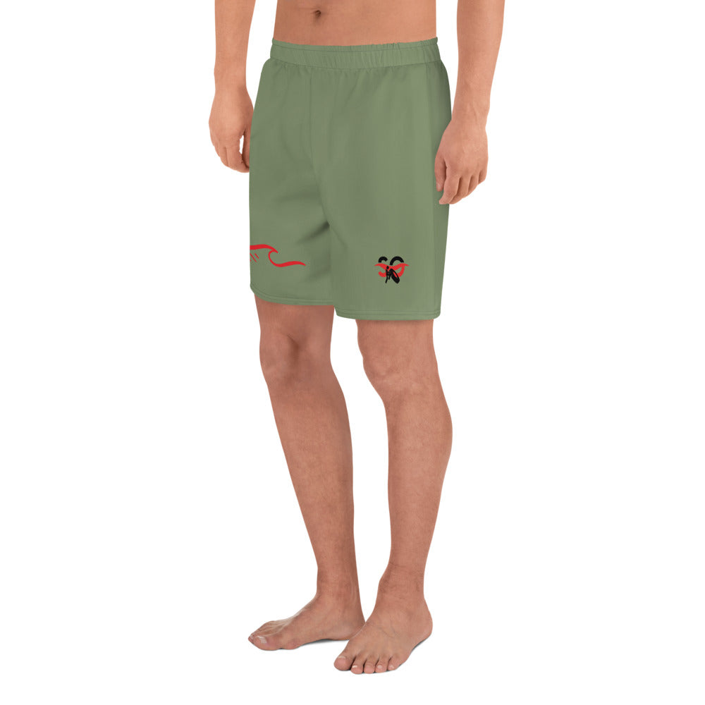 a man wearing a pair of green shorts