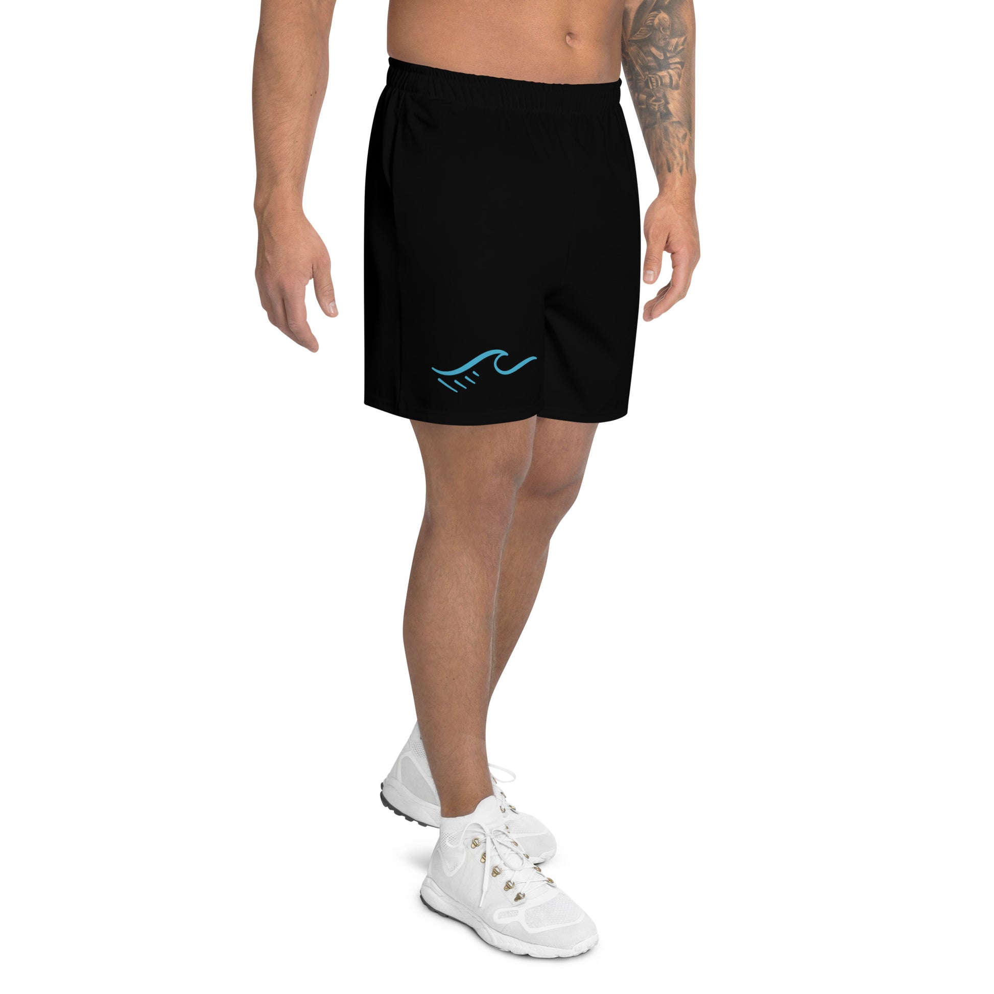 a man wearing a black shorts with a blue wave on the side