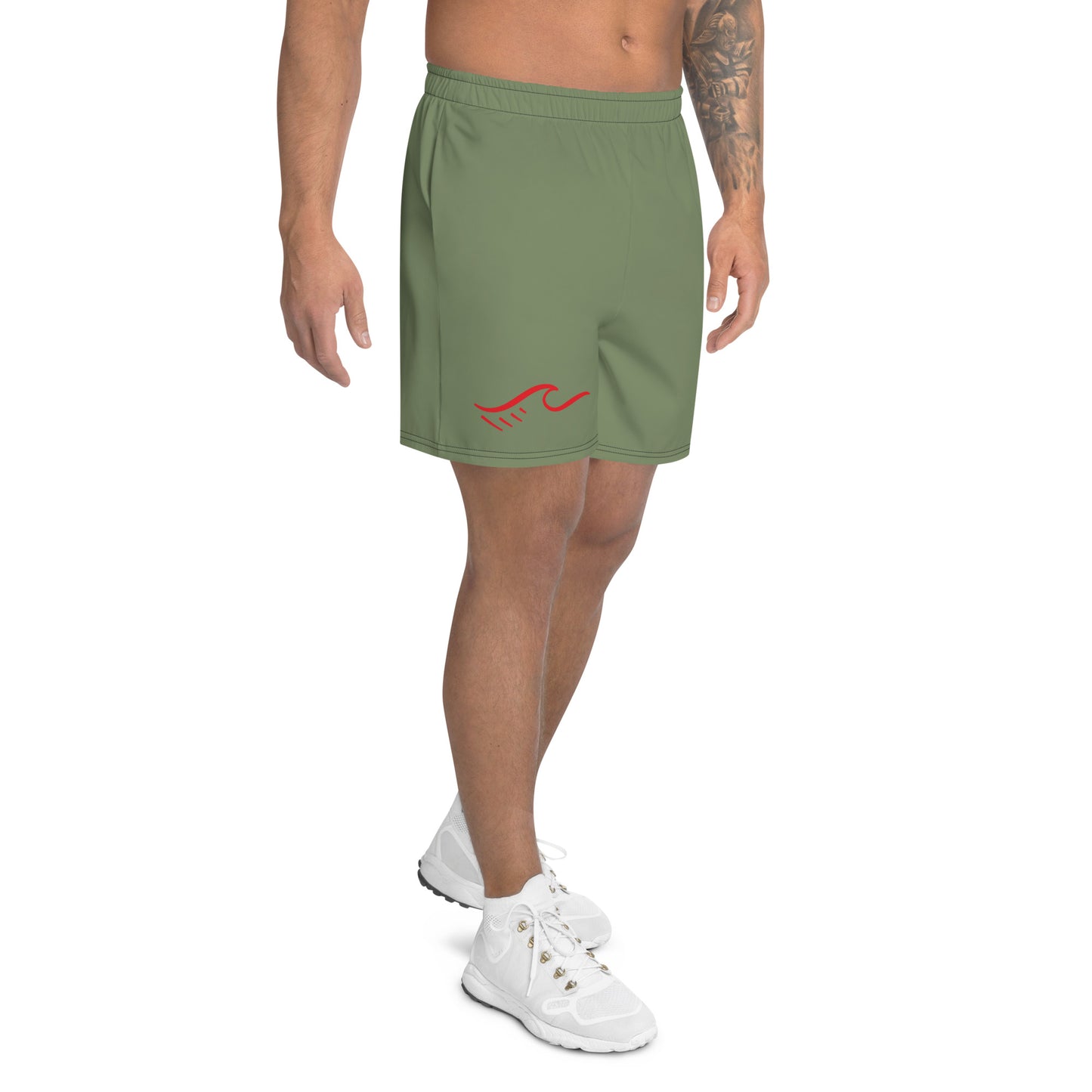 a man wearing a pair of green shorts