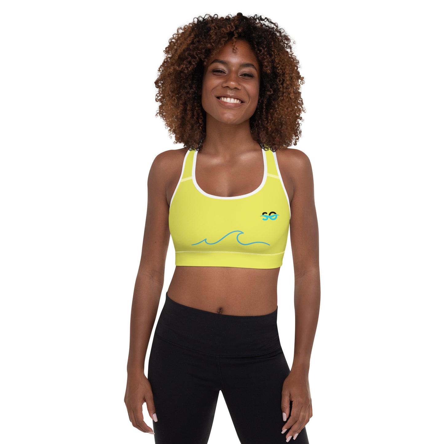 a woman in a yellow sports bra top