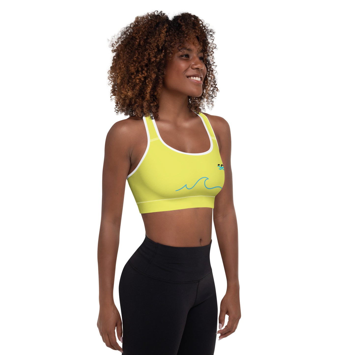 a woman in a yellow sports bra top