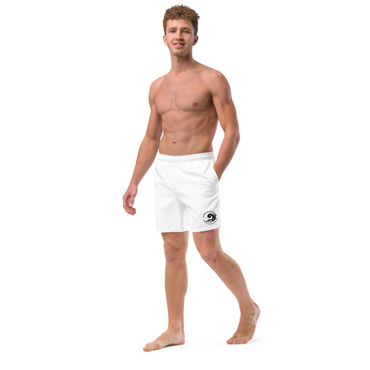 a man in white shorts is posing for a picture