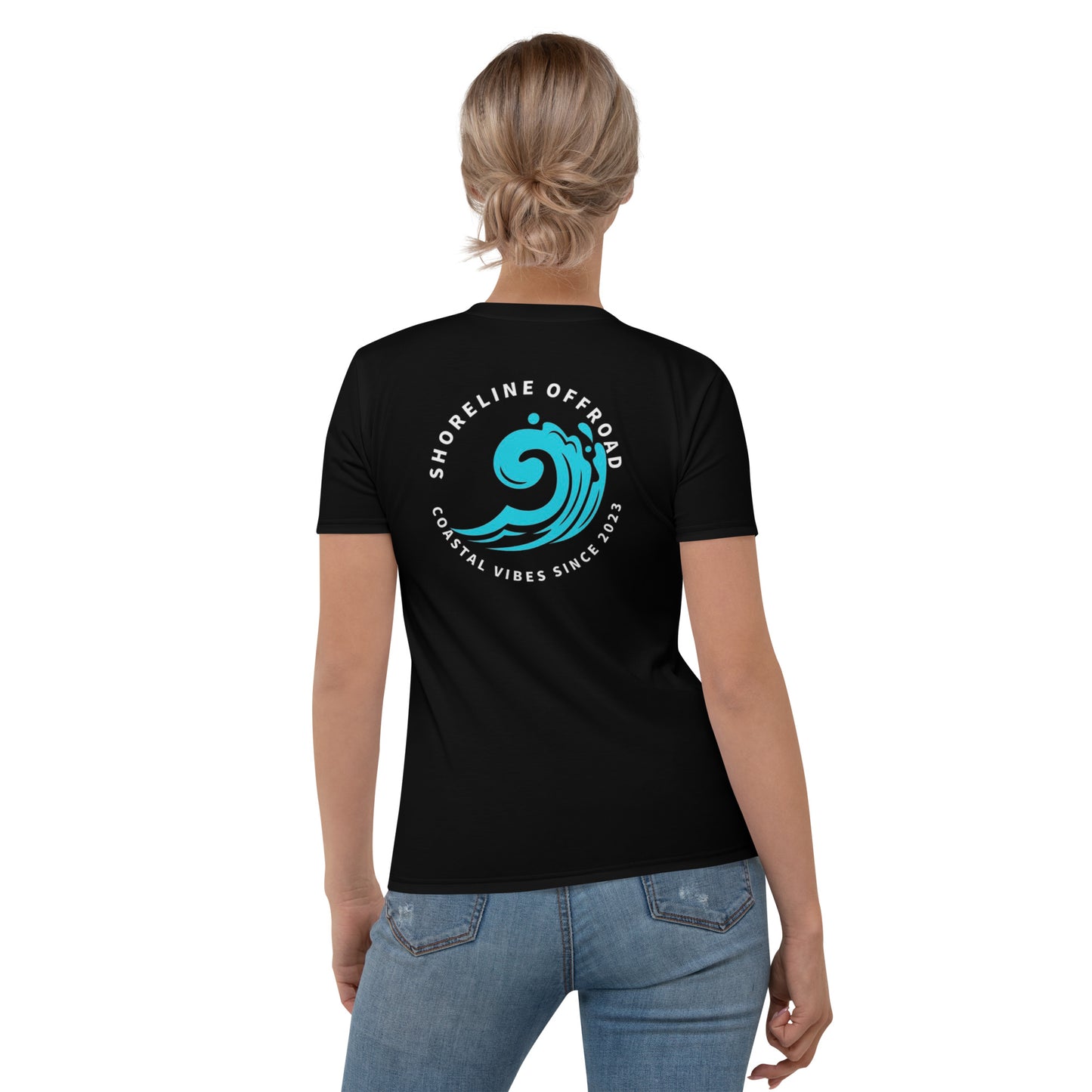 a woman wearing a black shirt with a blue wave on it