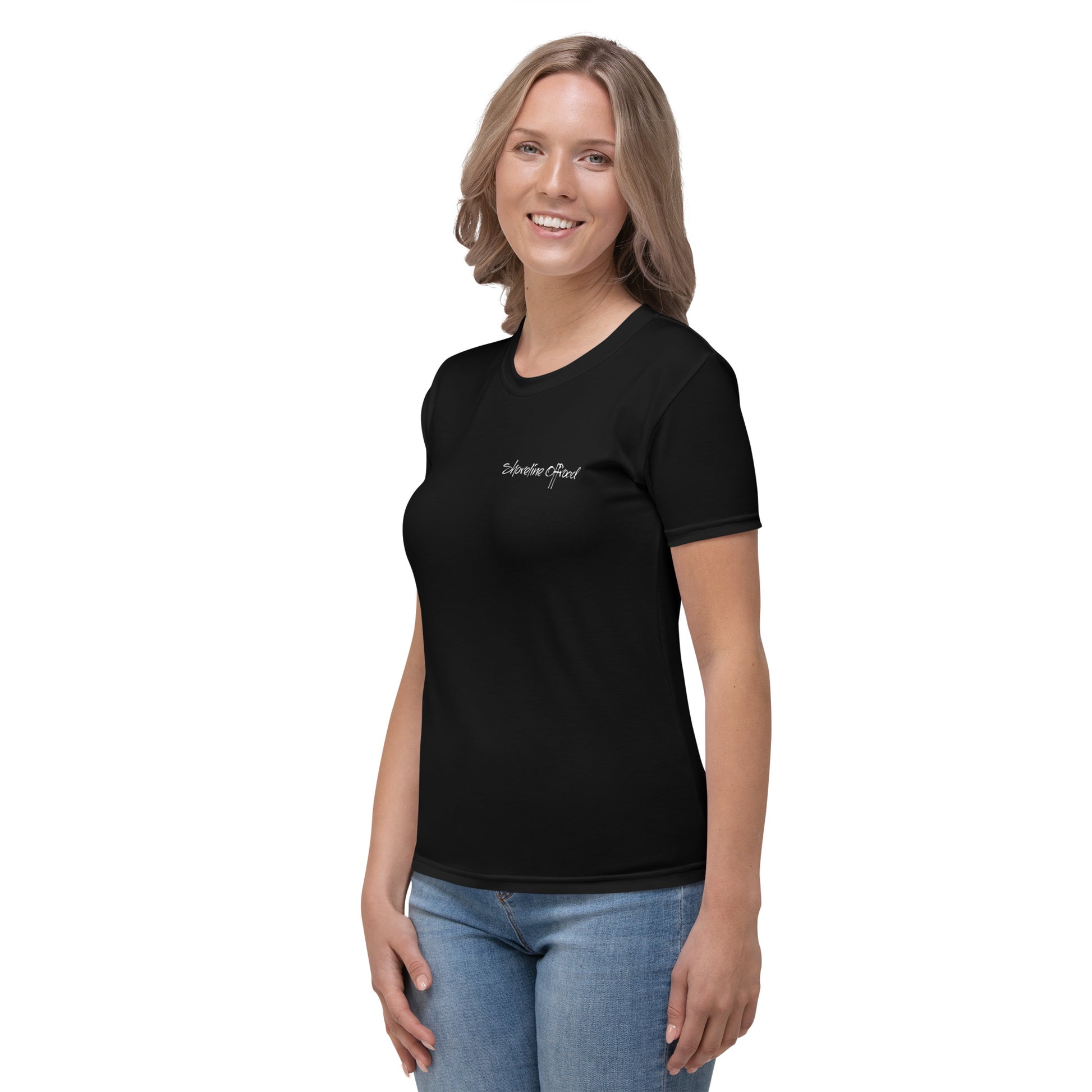 a woman wearing a black t - shirt with a white logo