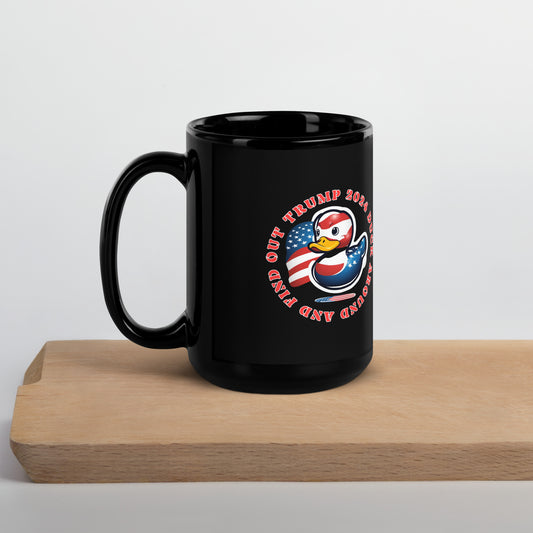 a black coffee mug sitting on top of a wooden table