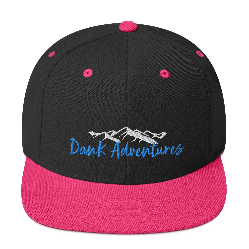 a black and pink hat with the words dark adventures on it