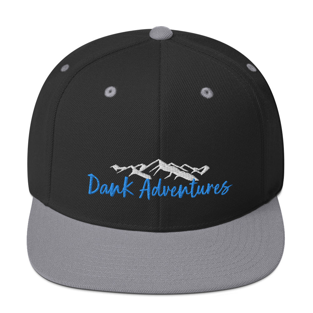 a black and grey hat with the words dark adventures on it