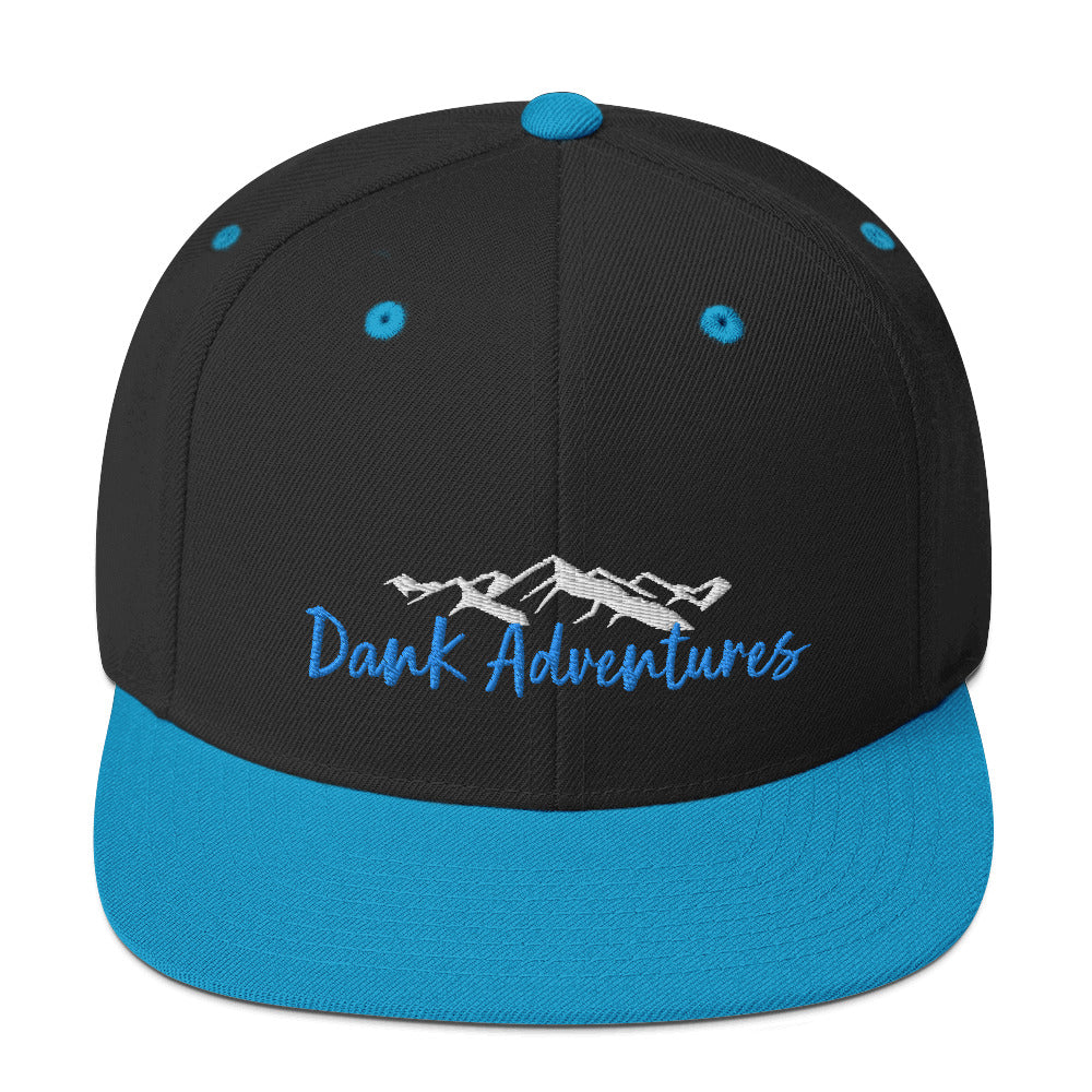 a black and blue hat with the words dark adventures on it