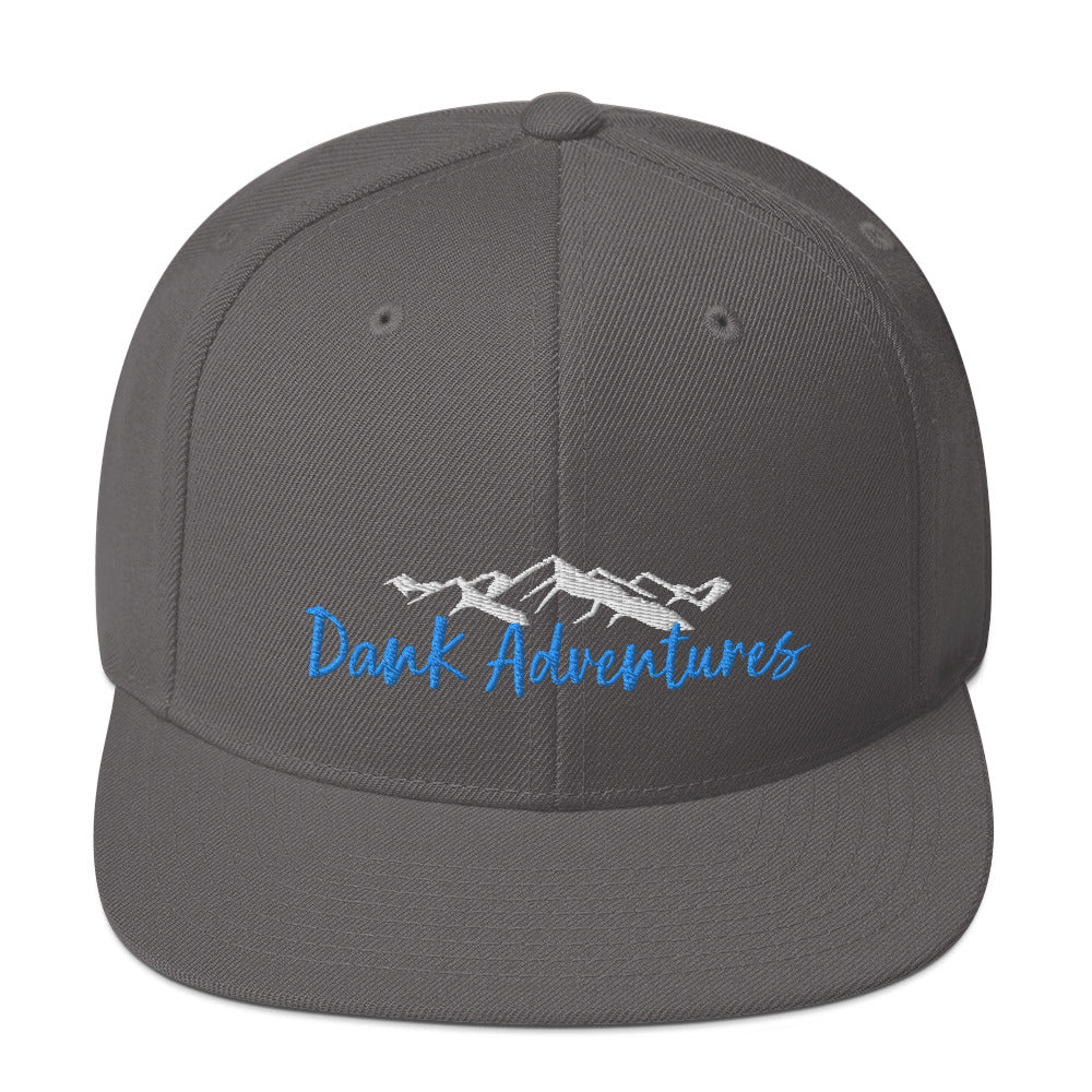 a gray hat with the words dark adventures on it