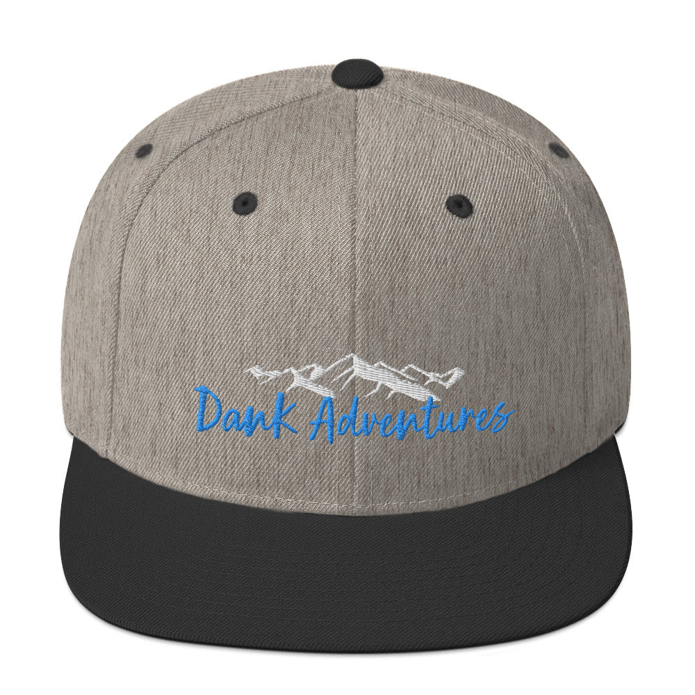 a grey and black hat with the words dark adventures on it