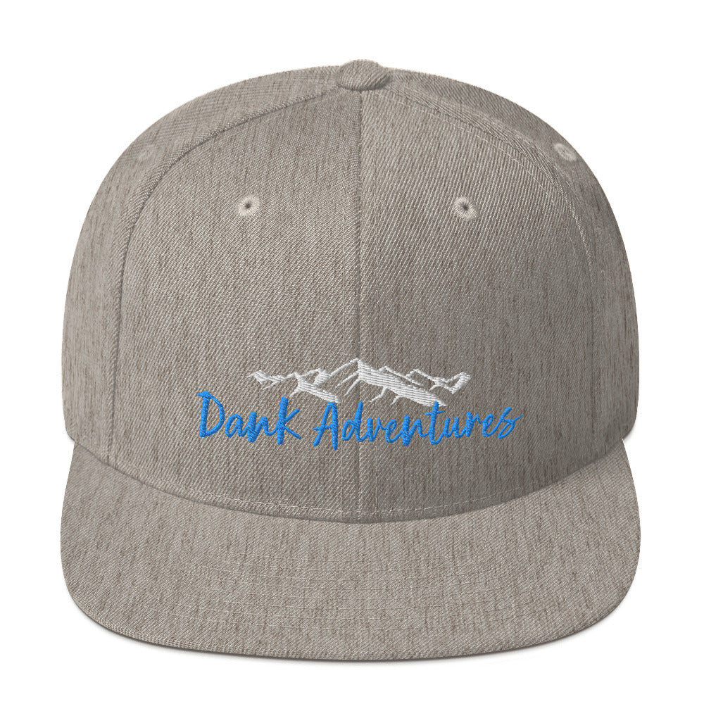 a gray hat with the words dark adventures on it