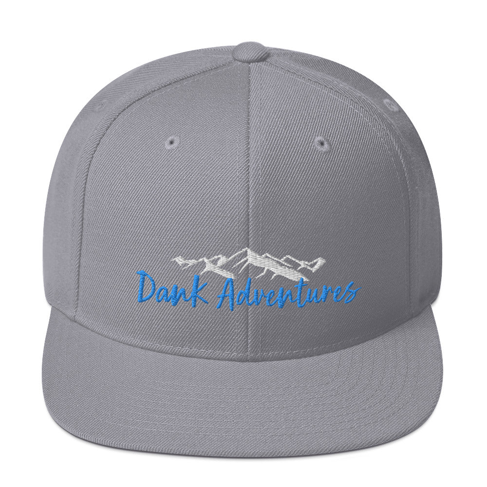 a grey hat with the words dark adventures on it