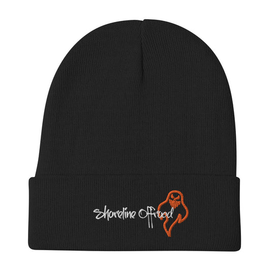 a black beanie with the logo of a woman