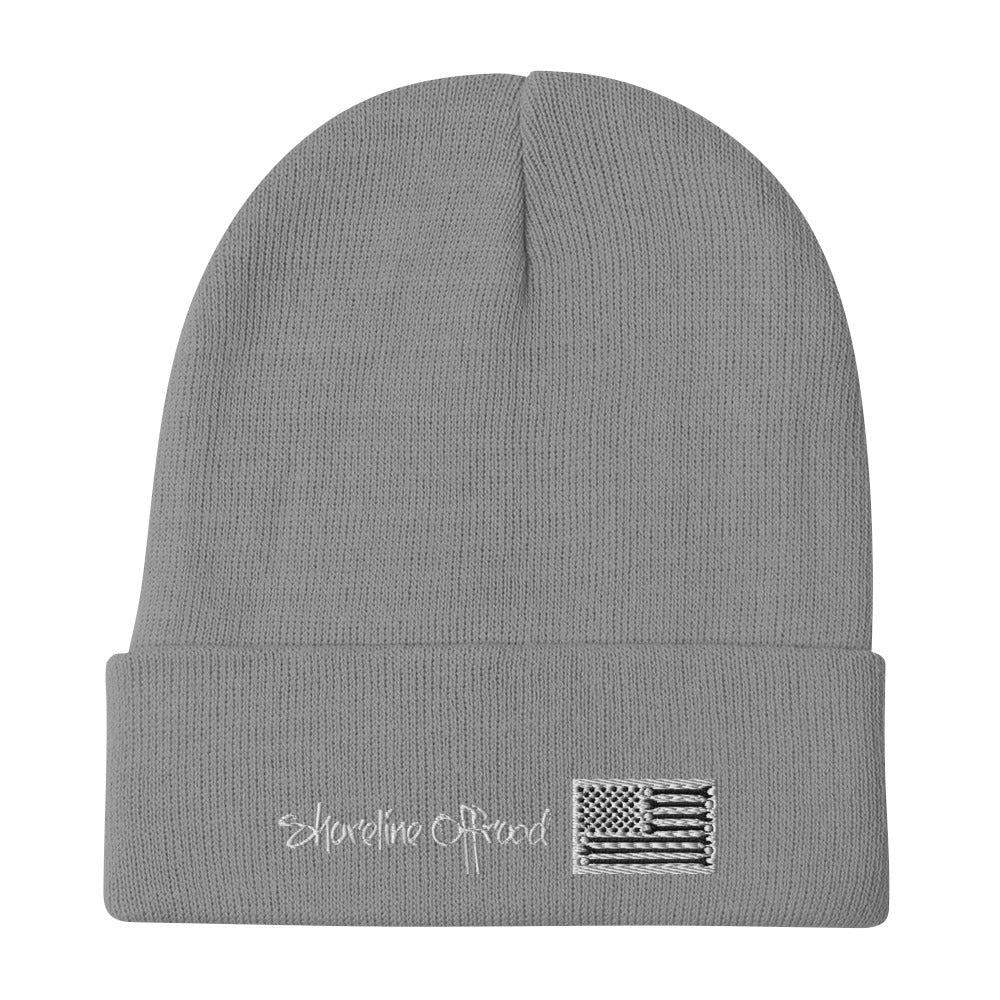 a grey beanie with the american flag on it