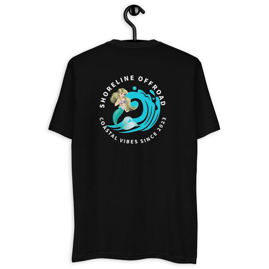 a black t - shirt with a surfer on it