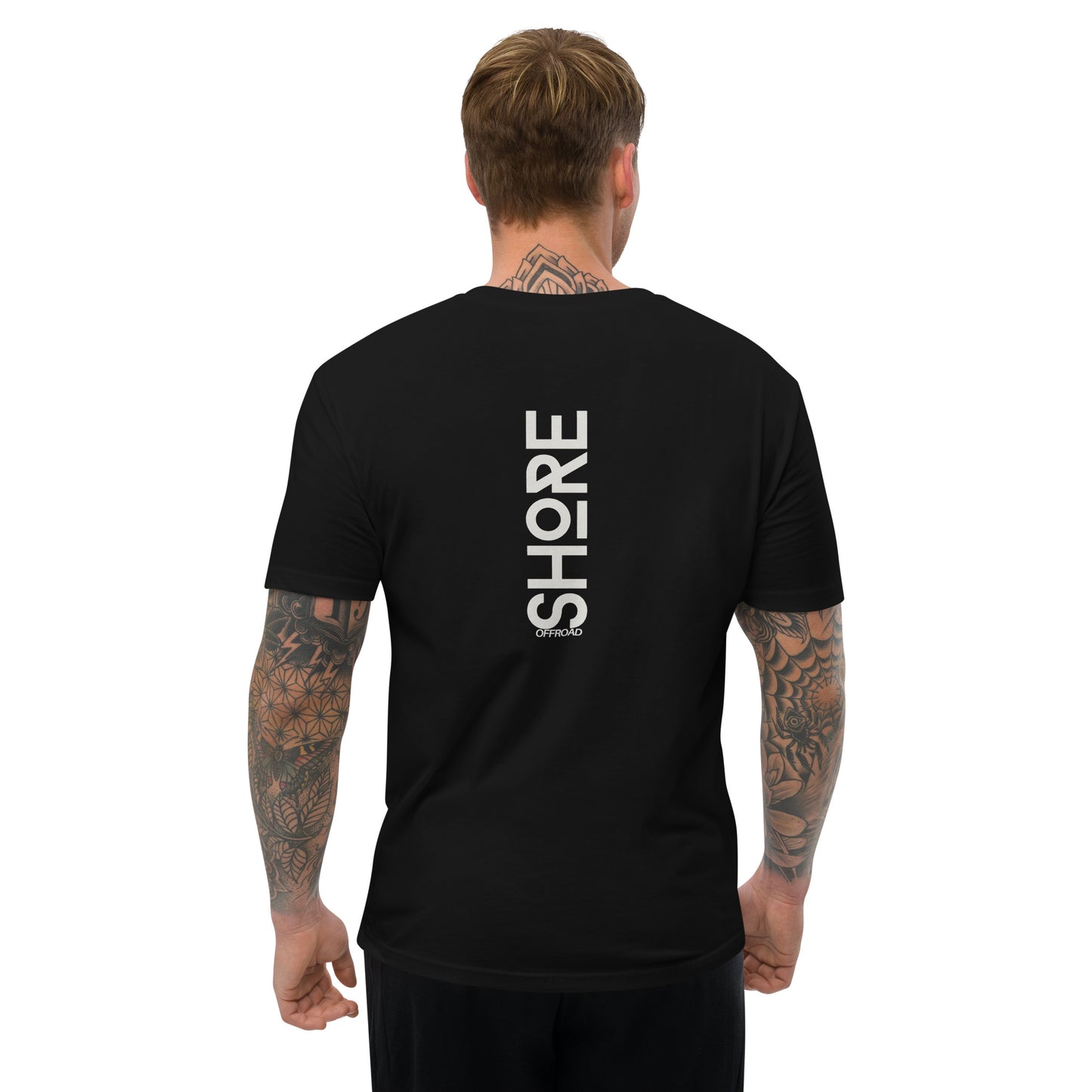 a man wearing a black shirt with the words shop on it
