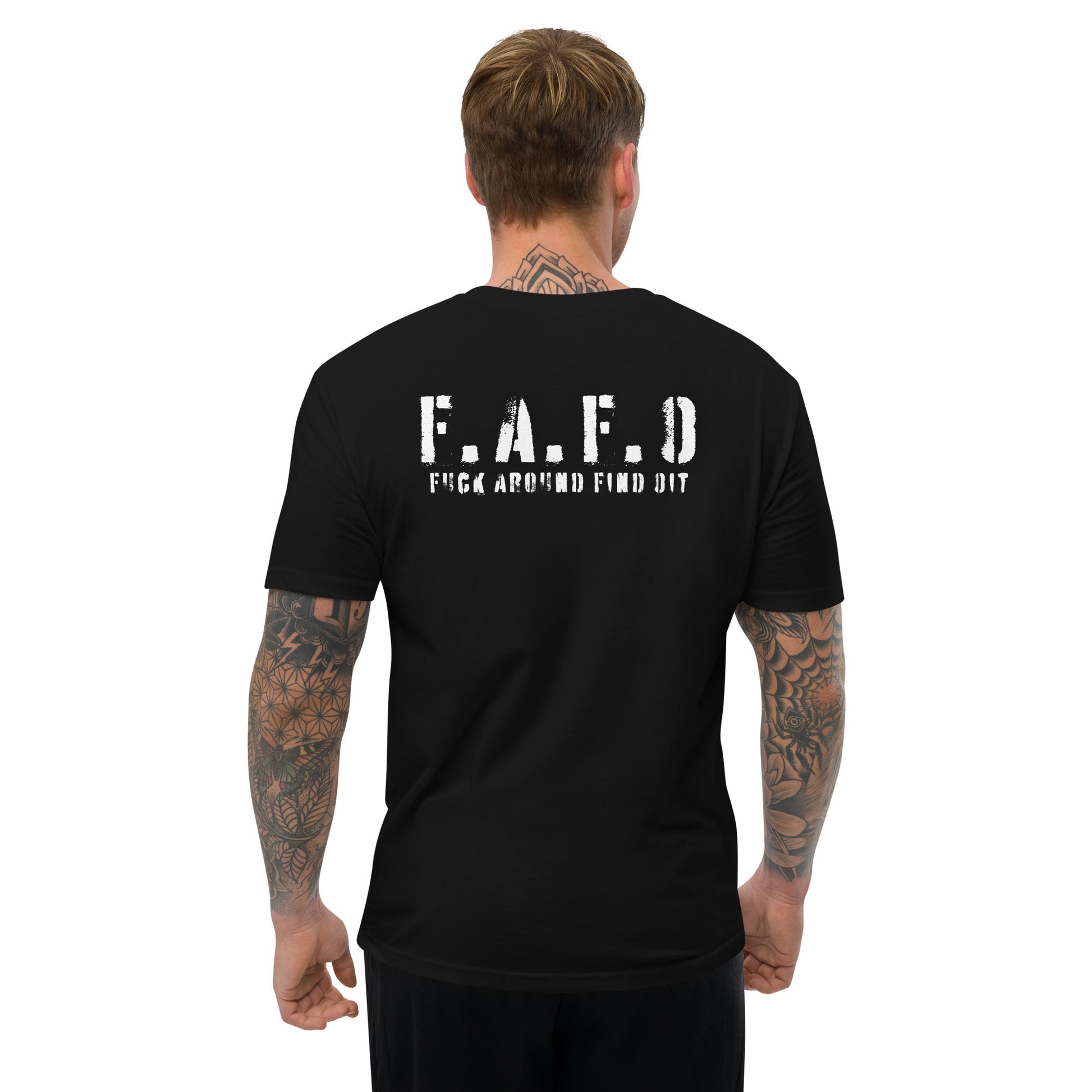 a man wearing a black t - shirt with the words f a d d printed