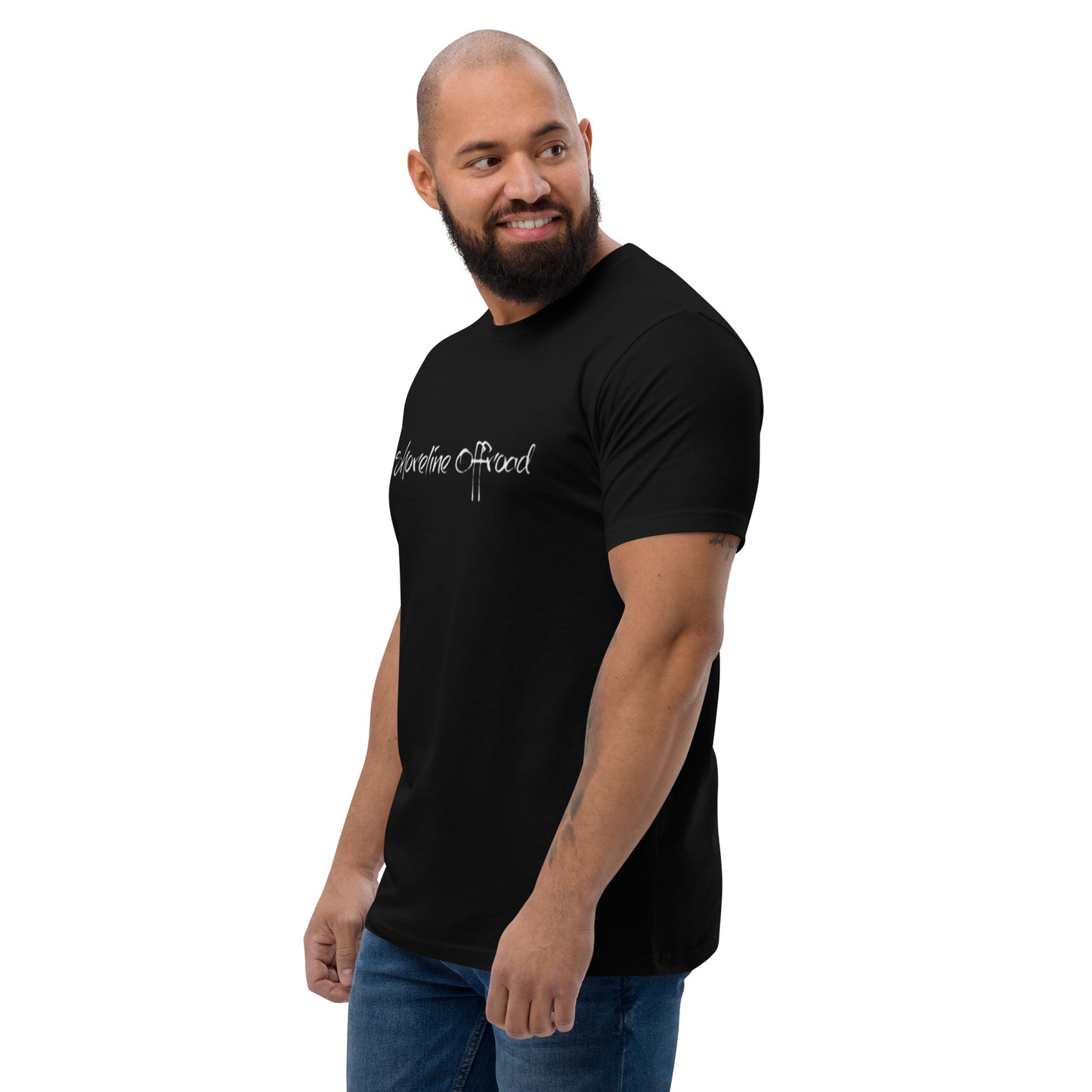 a man with a bald head wearing a black shirt