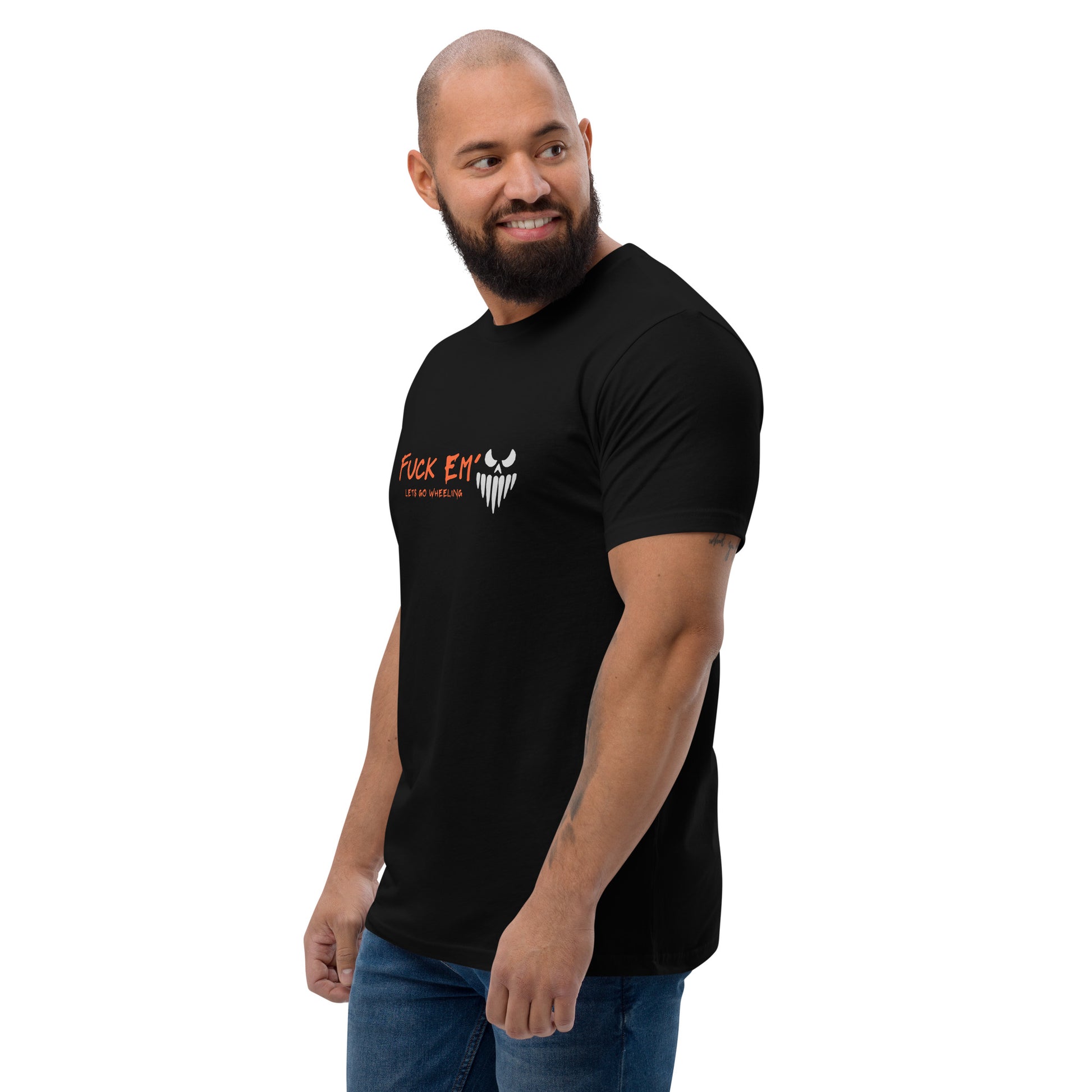 a man with a bald head wearing a black t - shirt