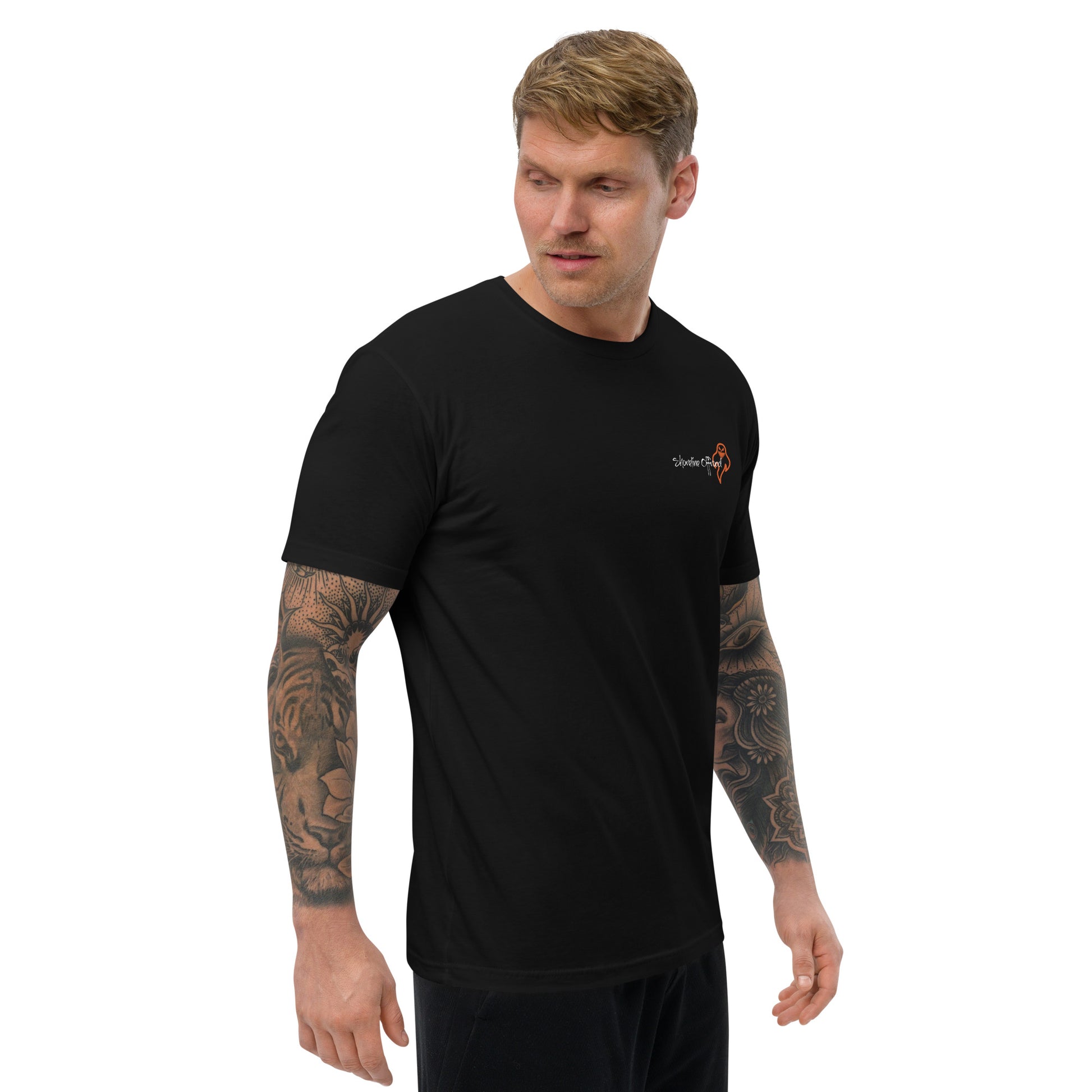 a man with a tattoo on his arm wearing a black shirt