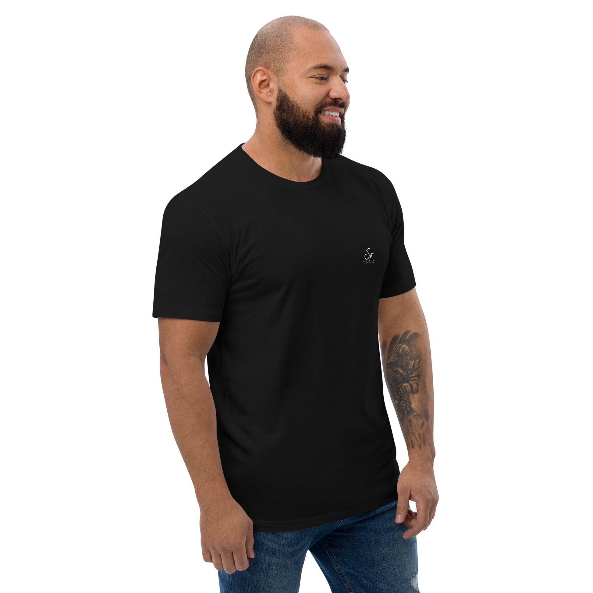 a man with a beard wearing a black t - shirt