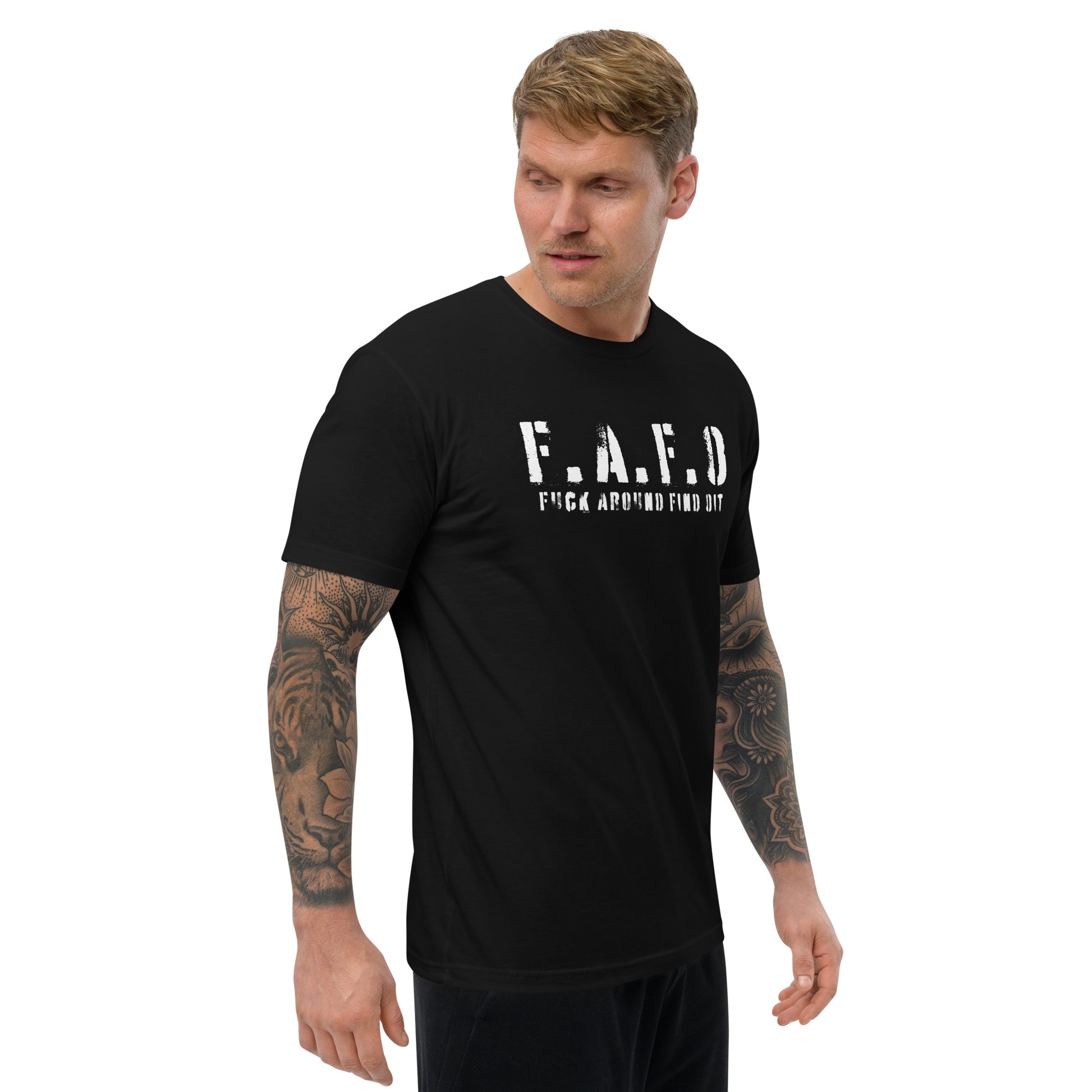 a man wearing a black t - shirt with the word f a f d on