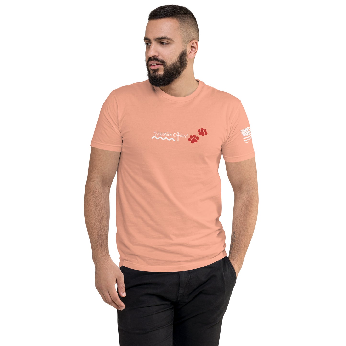 a man with a beard wearing a pink t - shirt