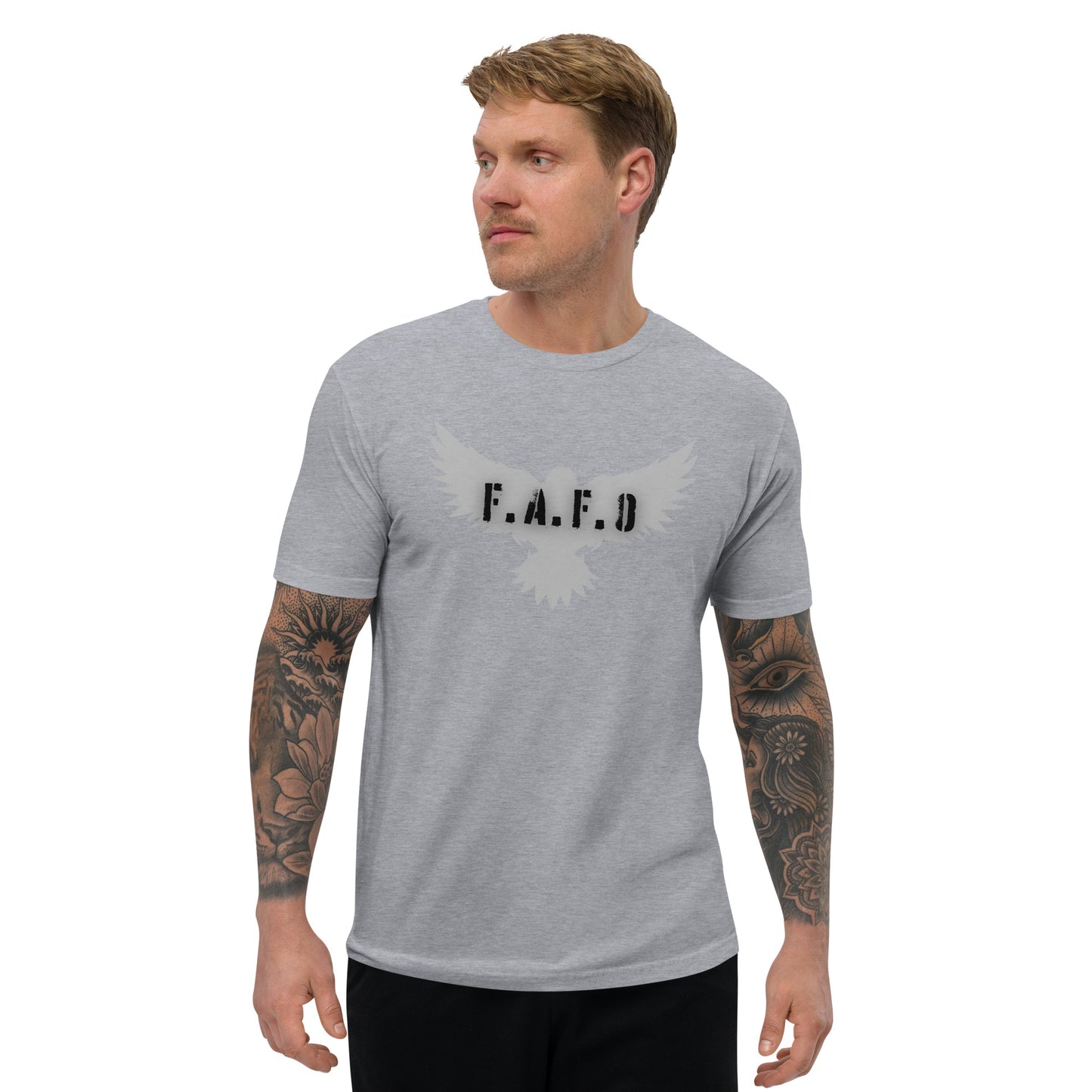 a man wearing a grey t - shirt with the word fa f d on it