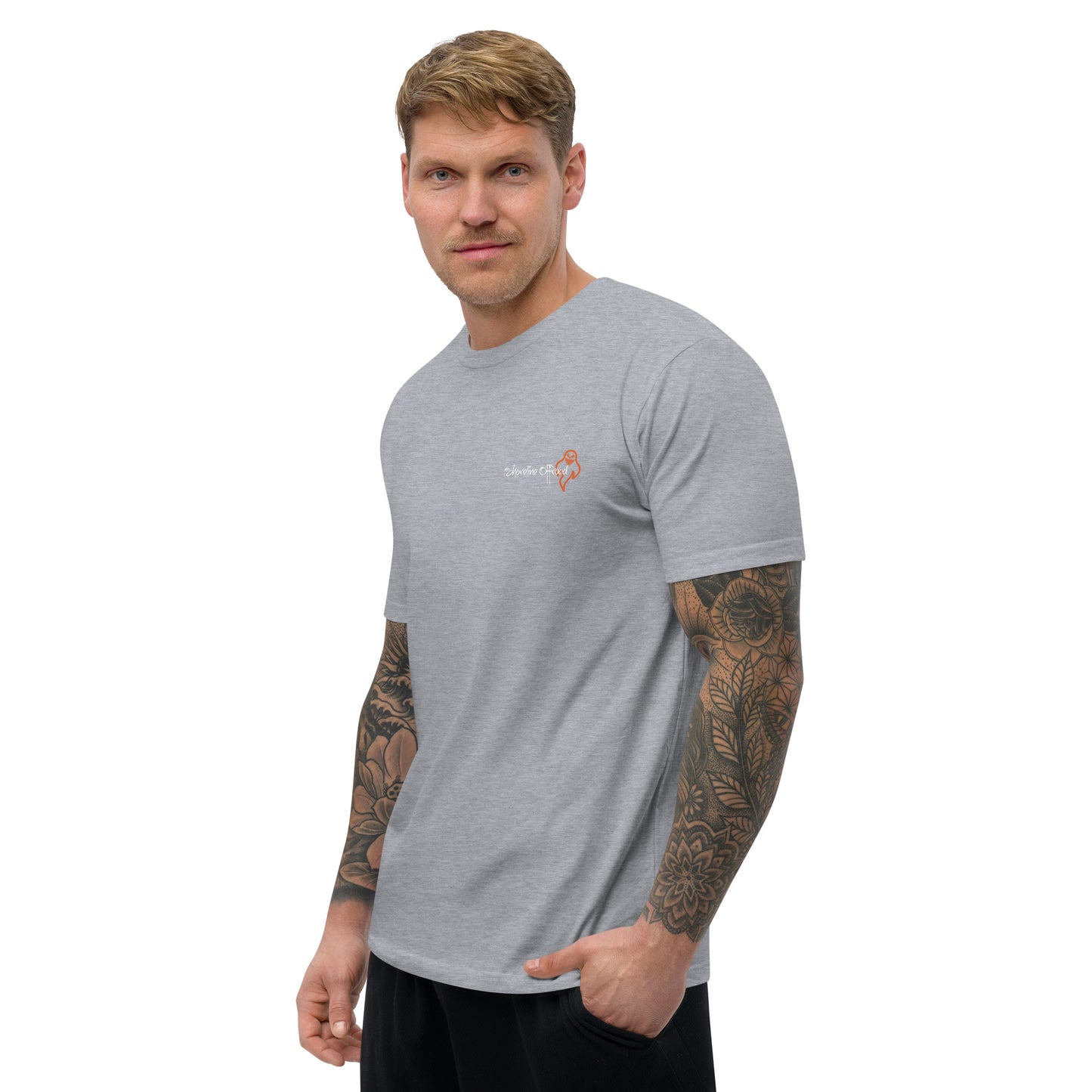 a man with a tattooed arm wearing a grey shirt